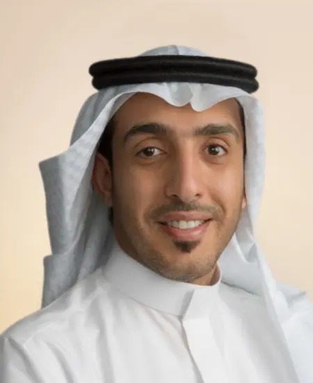 Business professionals shaking hands, representing Solution Founder's collaboration with Eezee Group in Saudi Arabia