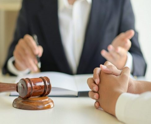 Legal professionals discussion illustrating automated marketing and outreach workflows