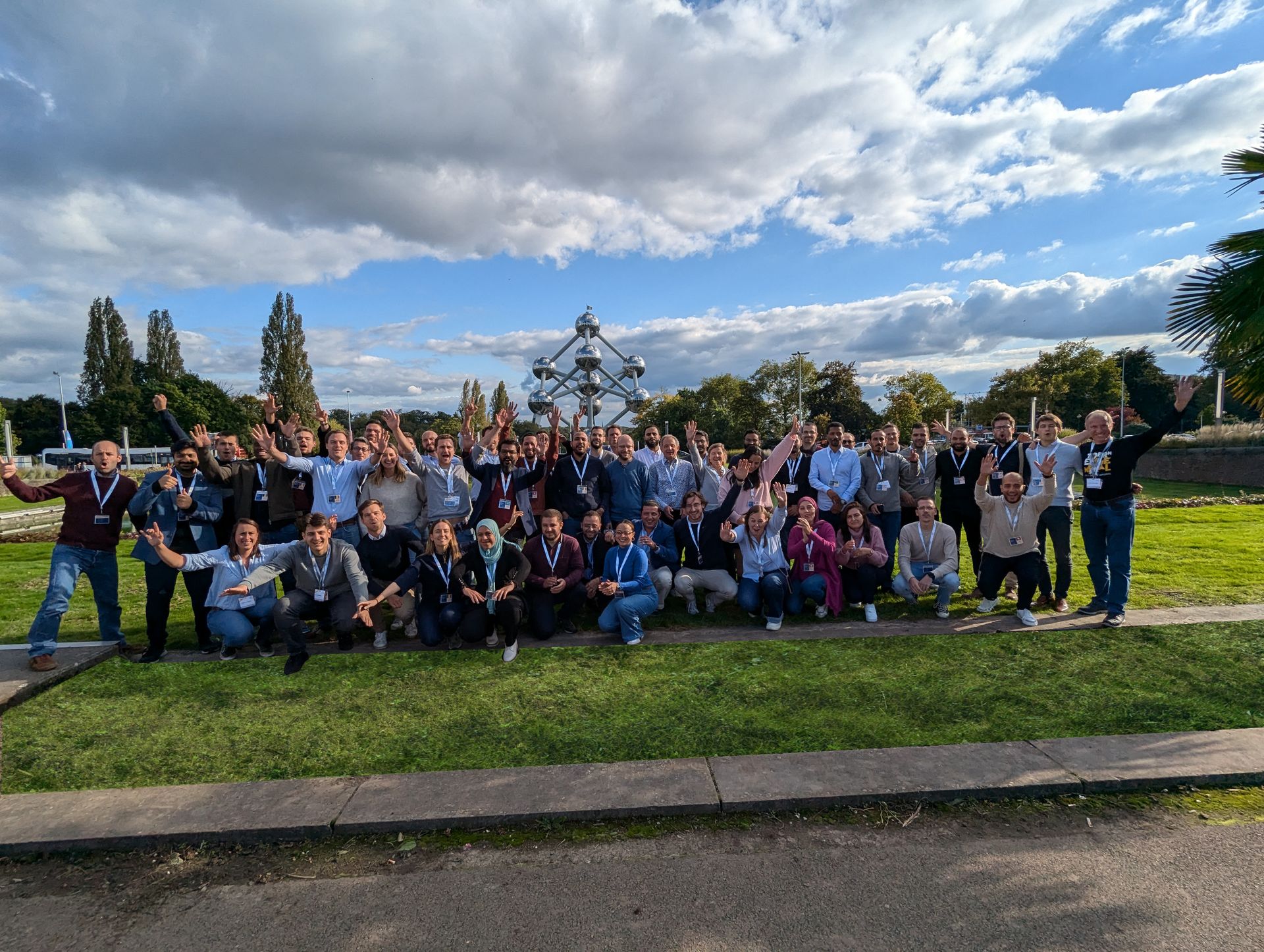 Group photo of Solution Founder team outdoors, representing the strength of Eezee Group's international collaboration