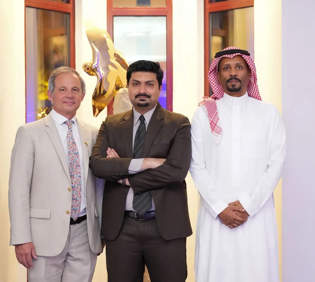 Solution Founder team members in business attire, representing the company's commitment to customer success