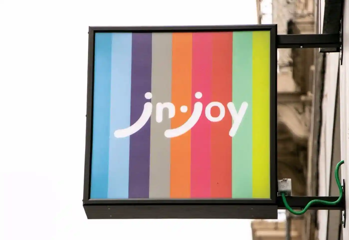 J&JOY store signage representing seamless Shopify-Odoo integration